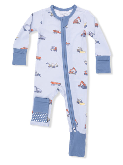Light blue baby pajamas with construction vehicle patterns, featuring a front zipper and polka dot details.