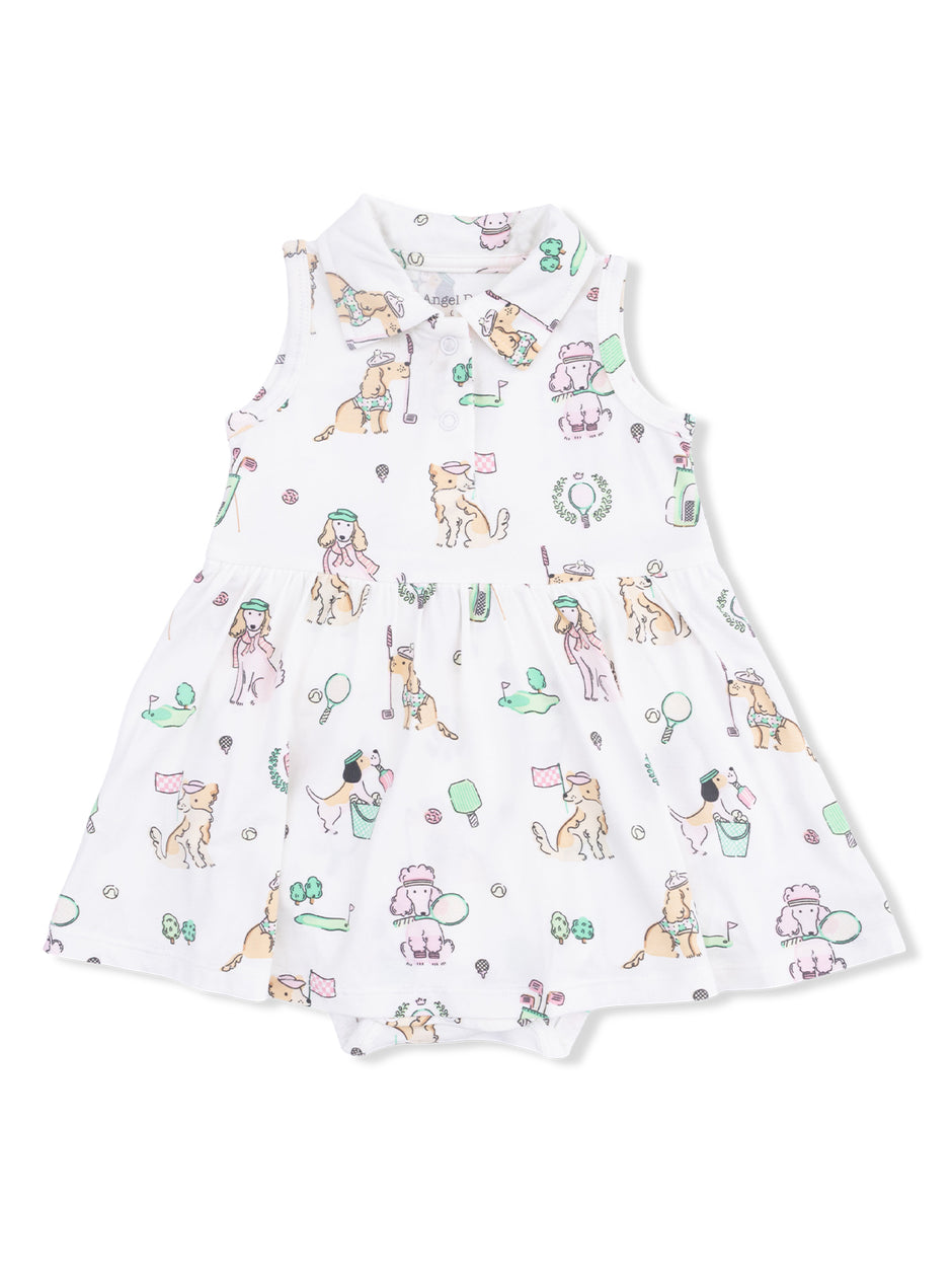 White dress with playful dog and ice cream patterns, featuring a collared neck and skirted design.