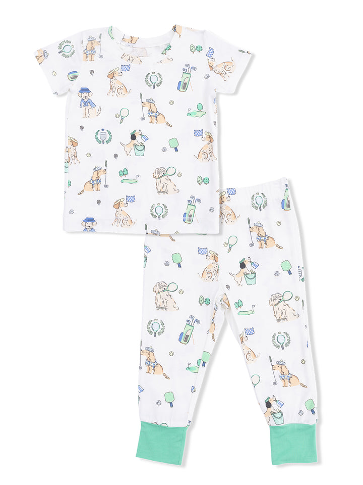 Kids' short-sleeve pajama set with playful dog print in pastel colors and contrasting green cuffs.