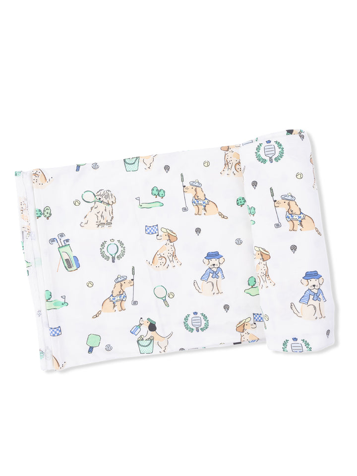 White fabric featuring playful dog illustrations engaged in various sports activities like golf and tennis.