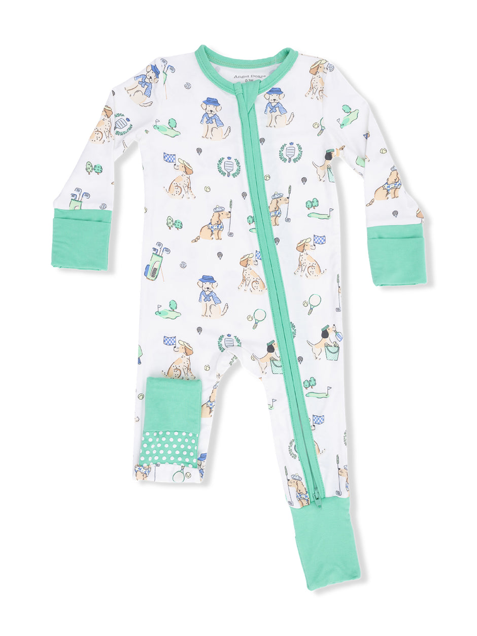 White baby onesie with dog illustrations, green accents, and a front zipper. Perfect for playtime or sleep.