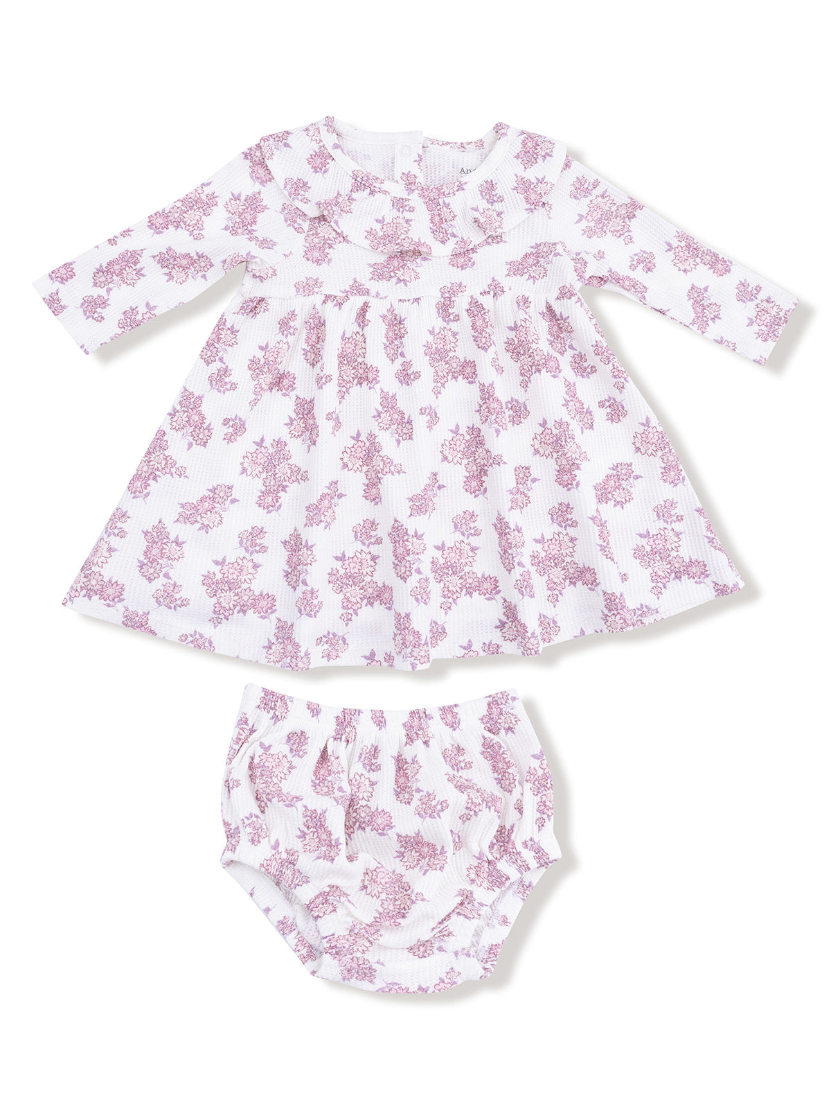White dress with pink floral pattern and matching bloomers, designed for infants. Soft, comfortable fabric.