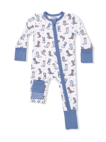 White and blue children's onesie with cowboy boots print and a front zip closure. Perfect for cozy and playful wear.