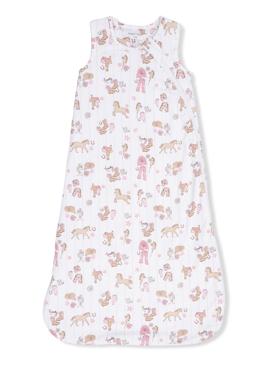 Children's sleep sack with a whimsical animal print, including horses, and a soft, lightweight design.