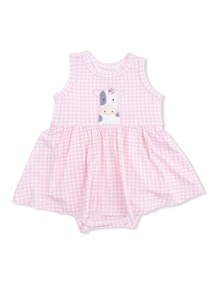 Pink gingham baby dress with cow print design and skirted bottom. Ideal for casual play or special occasions.