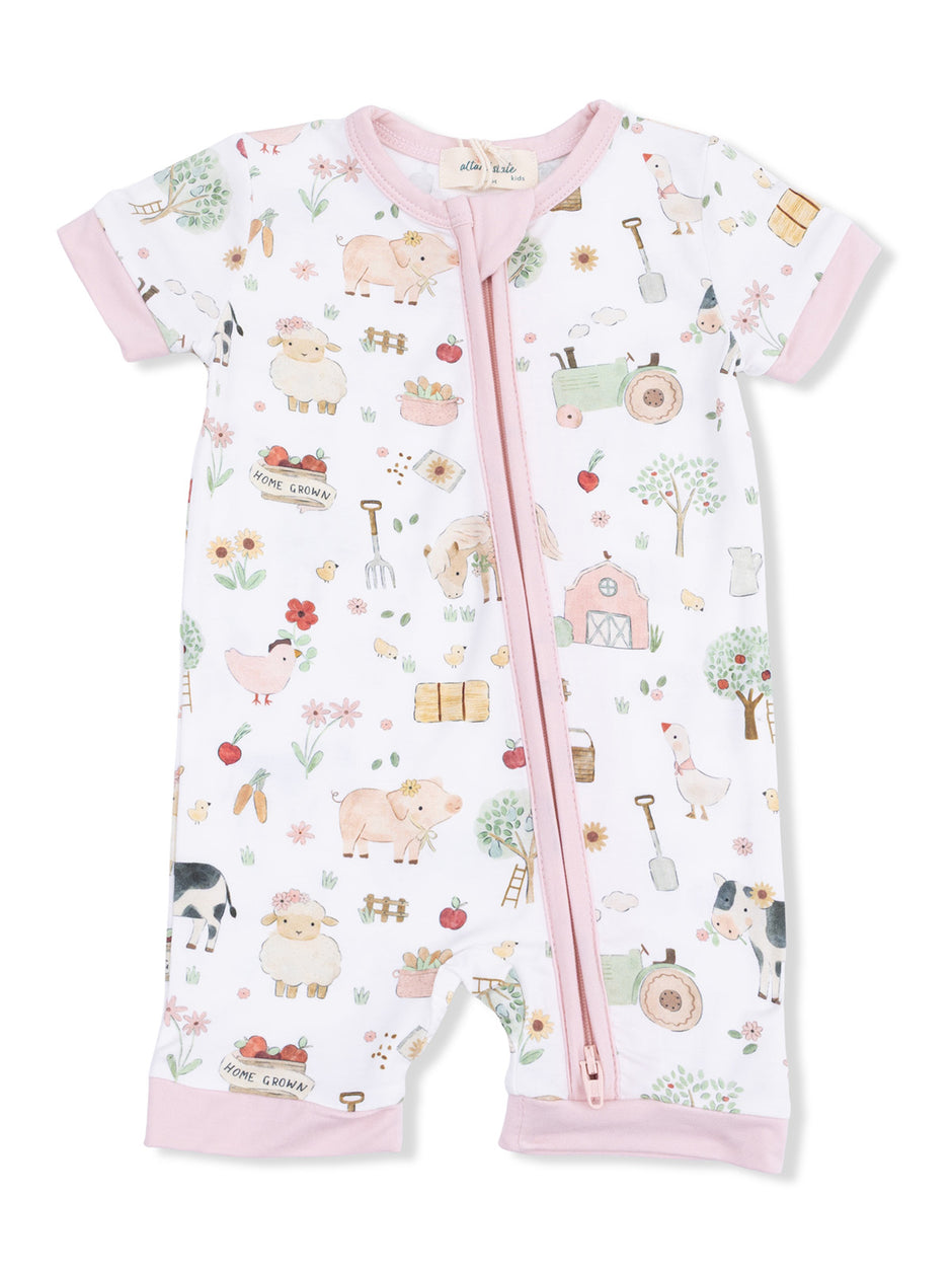 Child's short-sleeve romper featuring a whimsical farm-themed print with animals, plants, and farm equipment.