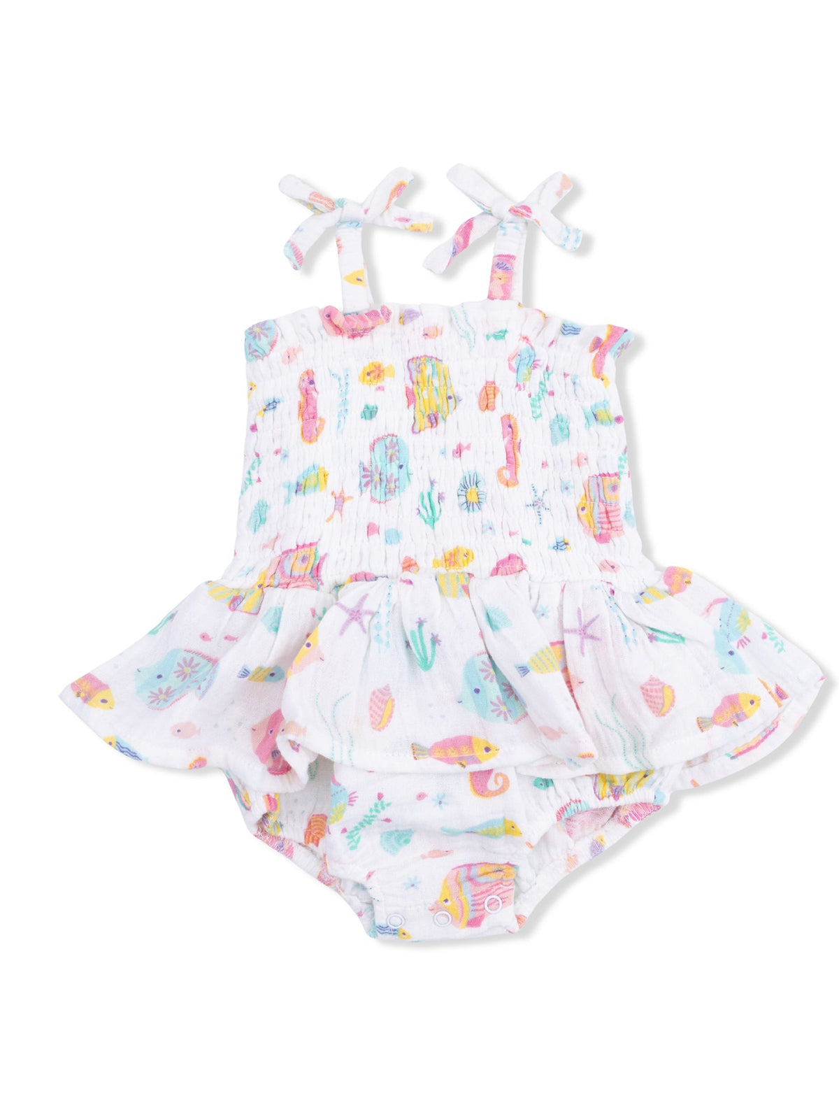 White toddler swimsuit with colorful sea-themed prints and ruffled skirt; perfect for summer fun.