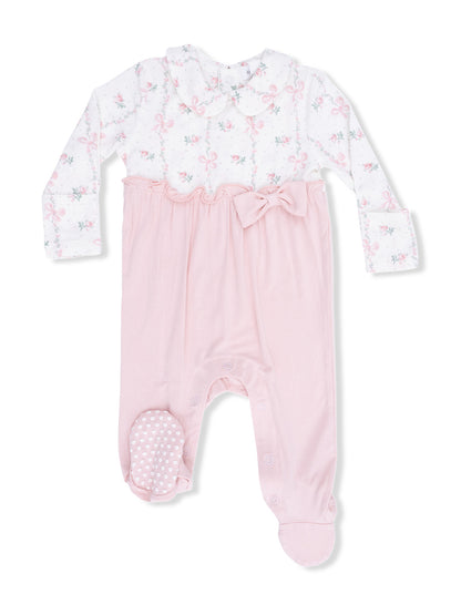 Pink baby romper with floral print, a bow detail, and snap closures for easy dressing. Ideal for infants.