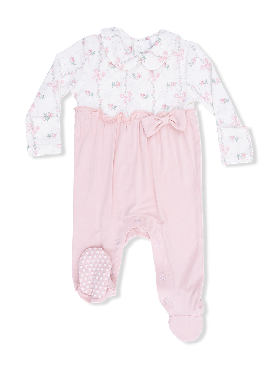 Pink baby romper with floral print, a bow detail, and snap closures for easy dressing. Ideal for infants.