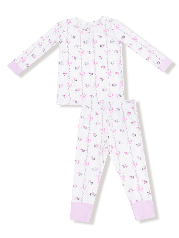 Girls' two-piece pajamas with floral print, long sleeves, and lilac cuffs. Ideal for cozy nighttime wear.