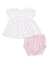 White floral baby dress with pink accents and matching bloomers. Ideal for infants or toddlers.