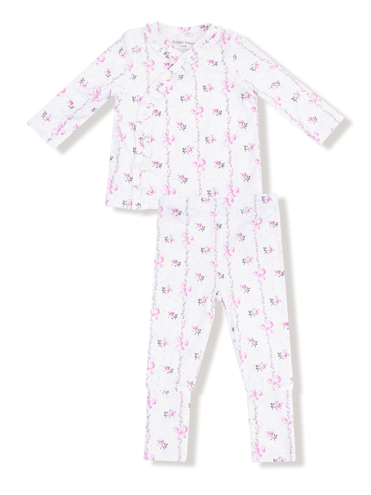 White pajama set with pink floral and bow pattern, including long sleeves and matching pants.