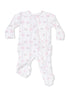 White baby onesie with pink bows and floral print, featuring long sleeves and footed design.