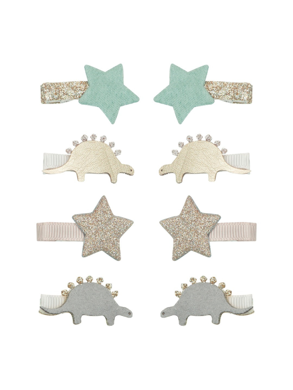 Set of hair clips featuring mint green stars and sparkly dinosaur designs in gold and silver.