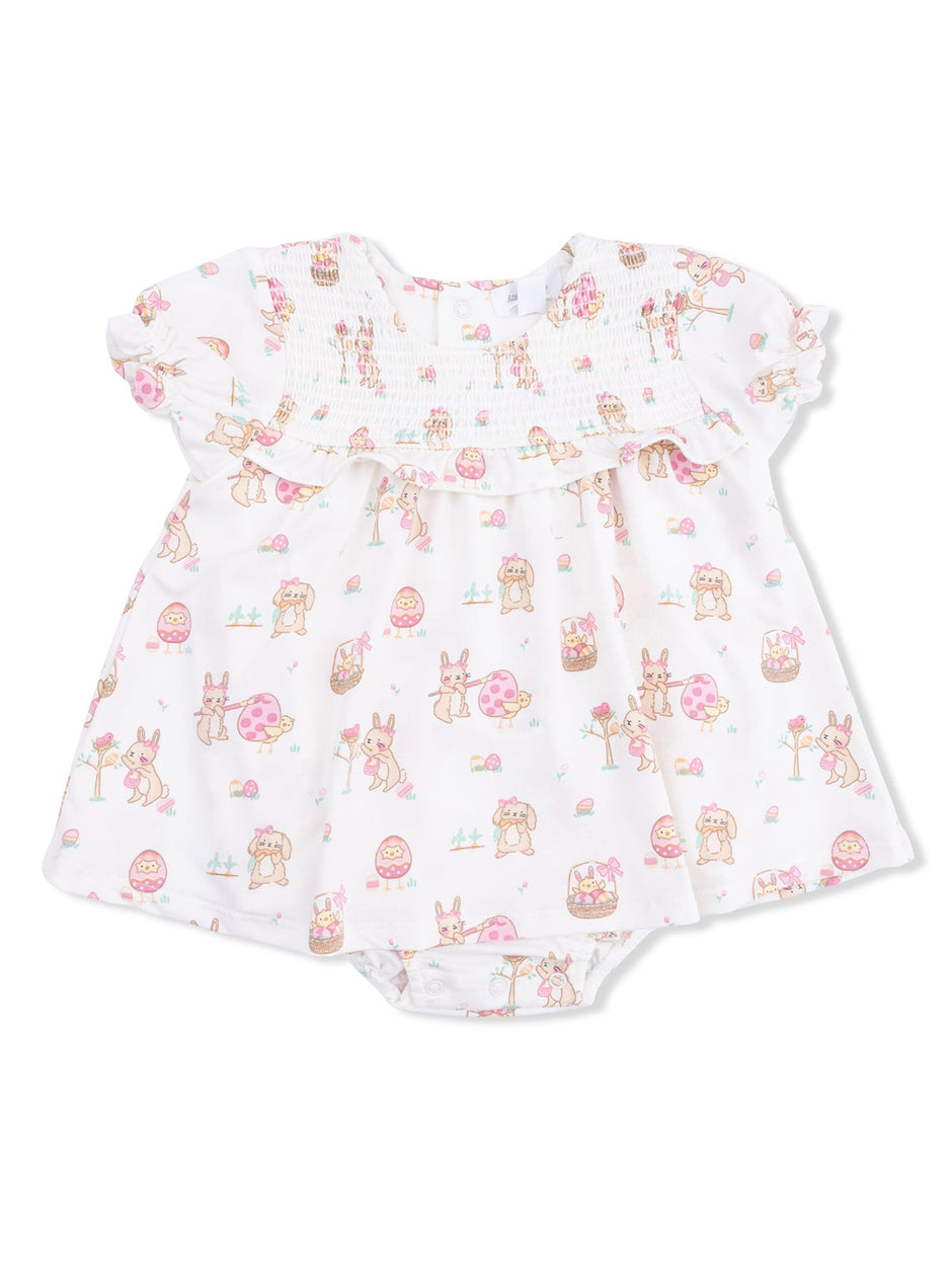White baby dress with pastel animal prints and floral designs, featuring short ruffled sleeves and a snap bottom.