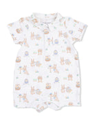 White baby romper with pastel bunny and Easter egg pattern and a collared neckline. Perfect for springtime outings.