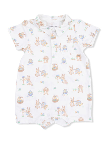 White baby romper with pastel bunny and Easter egg pattern and a collared neckline. Perfect for springtime outings.