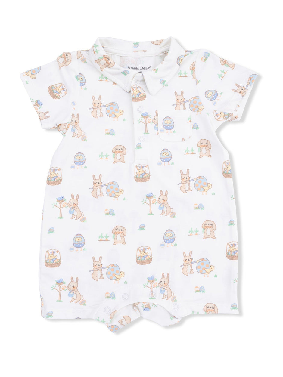 White baby romper with pastel bunny and Easter egg pattern and a collared neckline. Perfect for springtime outings.