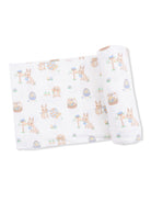 Patterned fabric with cute cartoon animals, including rabbits and chicks, in a playful spring design.