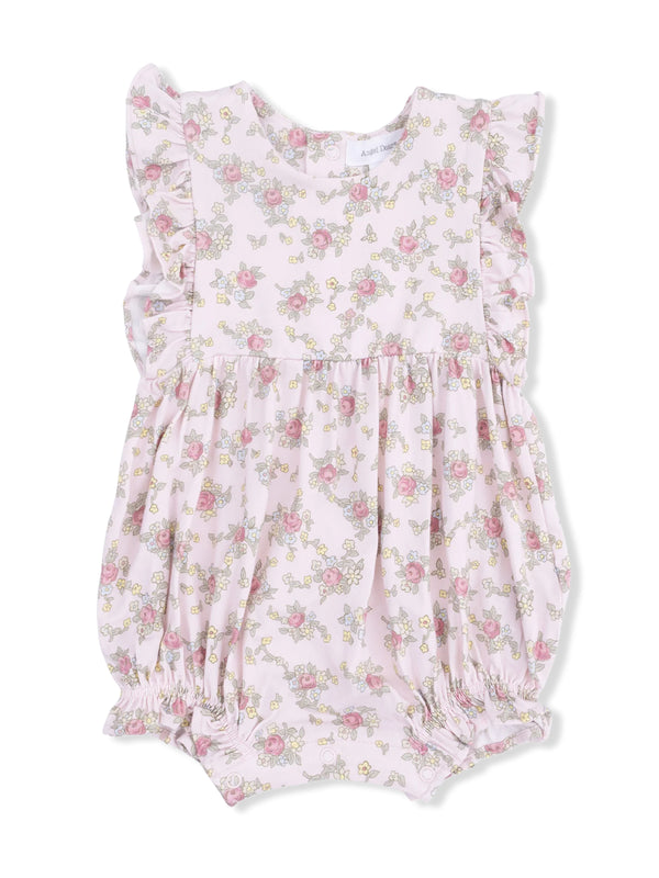 Floral baby romper in soft pink with ruffled sleeves and elasticized bottom for comfort.