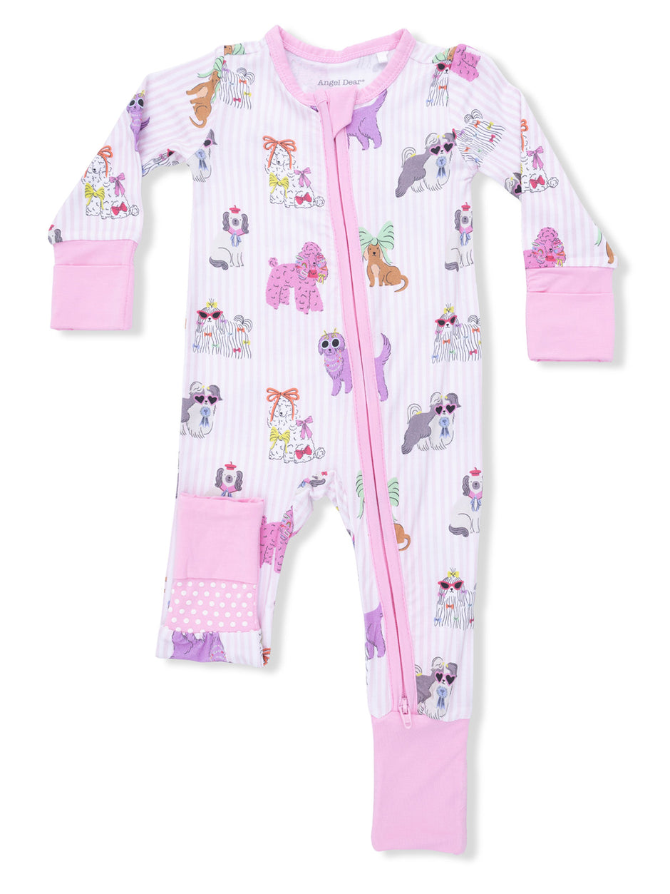 Children's pink pajamas with cute dog and cat patterns, featuring a front zipper and long sleeves.