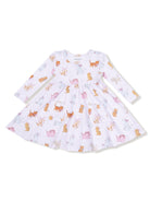 Long-sleeve dress with a playful animal print on a light striped background. Perfect for kids' casual wear.
