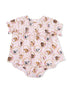 Light pink baby romper featuring various dog illustrations and floral accents with ruffled sleeves.