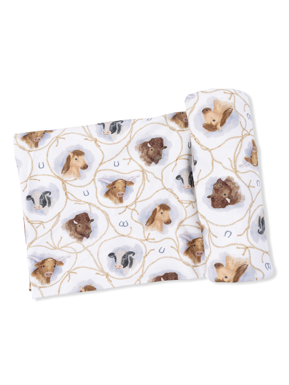 Fabric featuring animal heads, including horses and cows, with rope and horseshoe patterns on a white background.