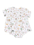 White baby outfit with colorful farm animal patterns and floral designs, featuring ruffled sleeves and a smocked bodice.