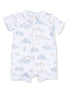 Baby romper with farm-themed print featuring tractors, animals, and barns on a light background.