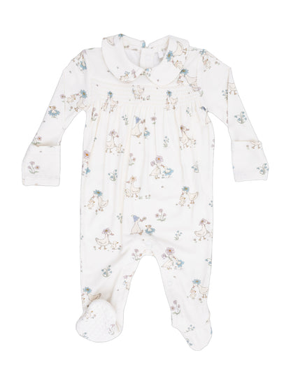 White baby onesie with playful floral and animal prints, featuring long sleeves and footed design.