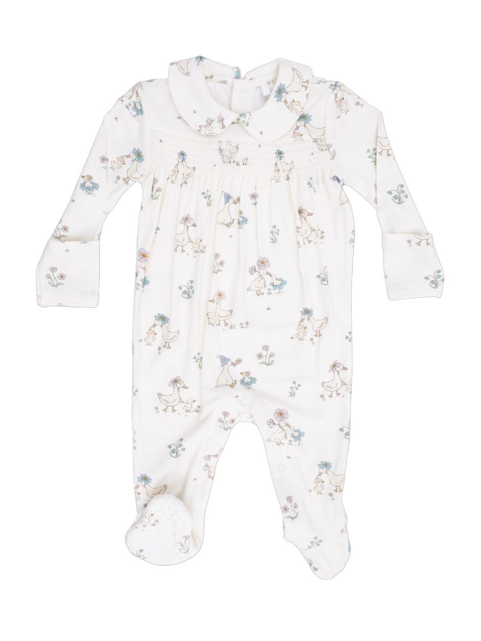 White baby onesie with playful floral and animal prints, featuring long sleeves and footed design.