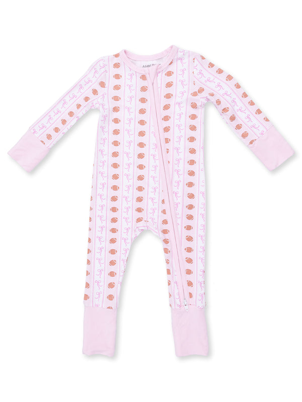 Pink zip-up onesie with playful patterns of bows and acorns on the front and solid pink cuffs. Ideal for toddlers.