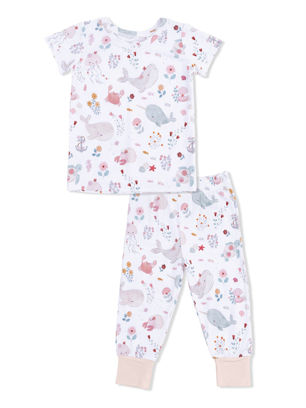 Kids' pajama set featuring a playful marine animal print on a white background. Short sleeve top and long pants.
