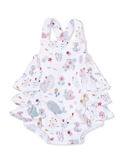 White one-piece swimsuit with ruffled sleeves and a colorful ocean-themed print featuring sea animals and flowers.