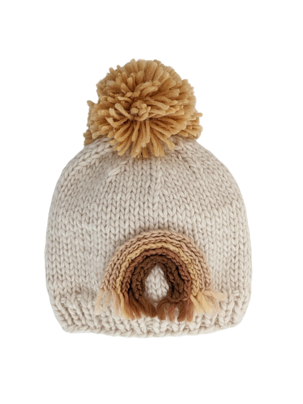 Cream knitted beanie with a brown rainbow design and a fluffy pom-pom on top.