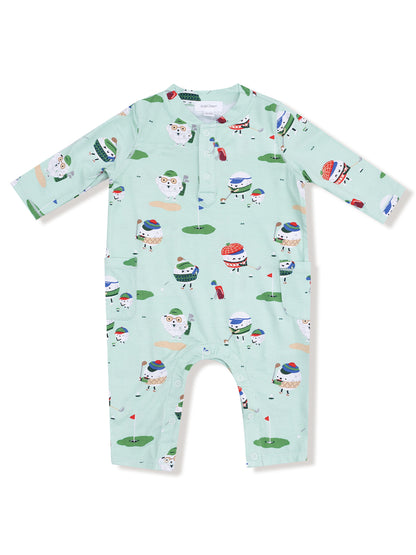 Light green jumpsuit featuring playful golf-themed cartoon characters in colorful hats and outfits.