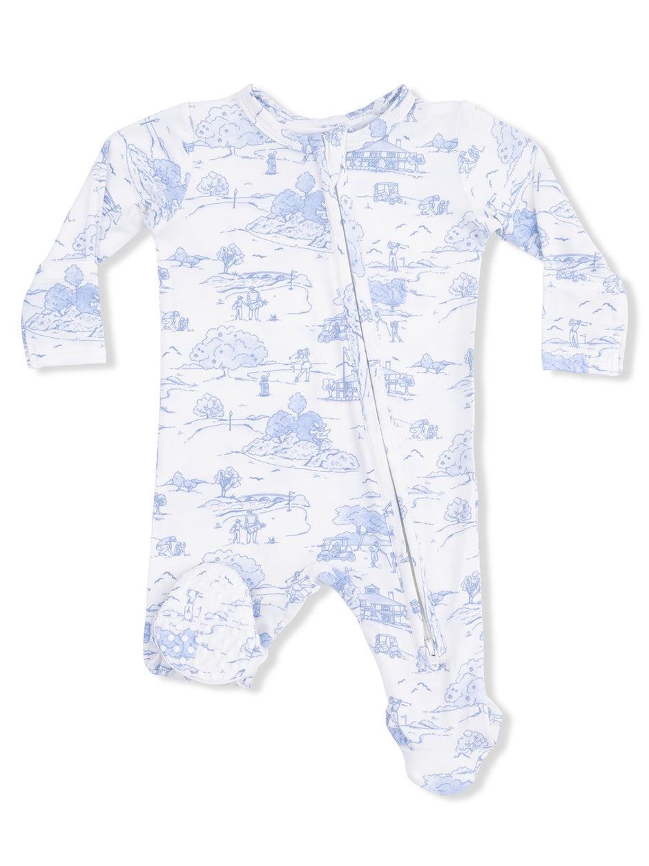 White baby onesie with blue landscape print, featuring long sleeves and a front zipper.