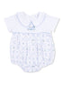 White baby romper with blue trim featuring golf-themed patterns and an embroidered car design on the chest.