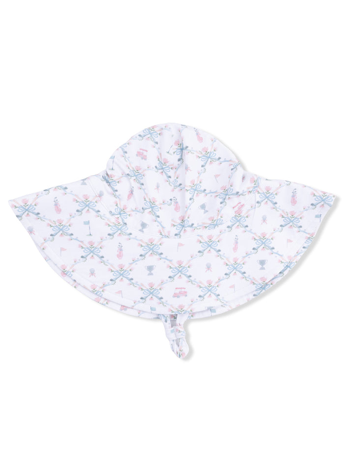 Children's sun hat with a playful pattern of ribbons, trophies, and flags on a light background.