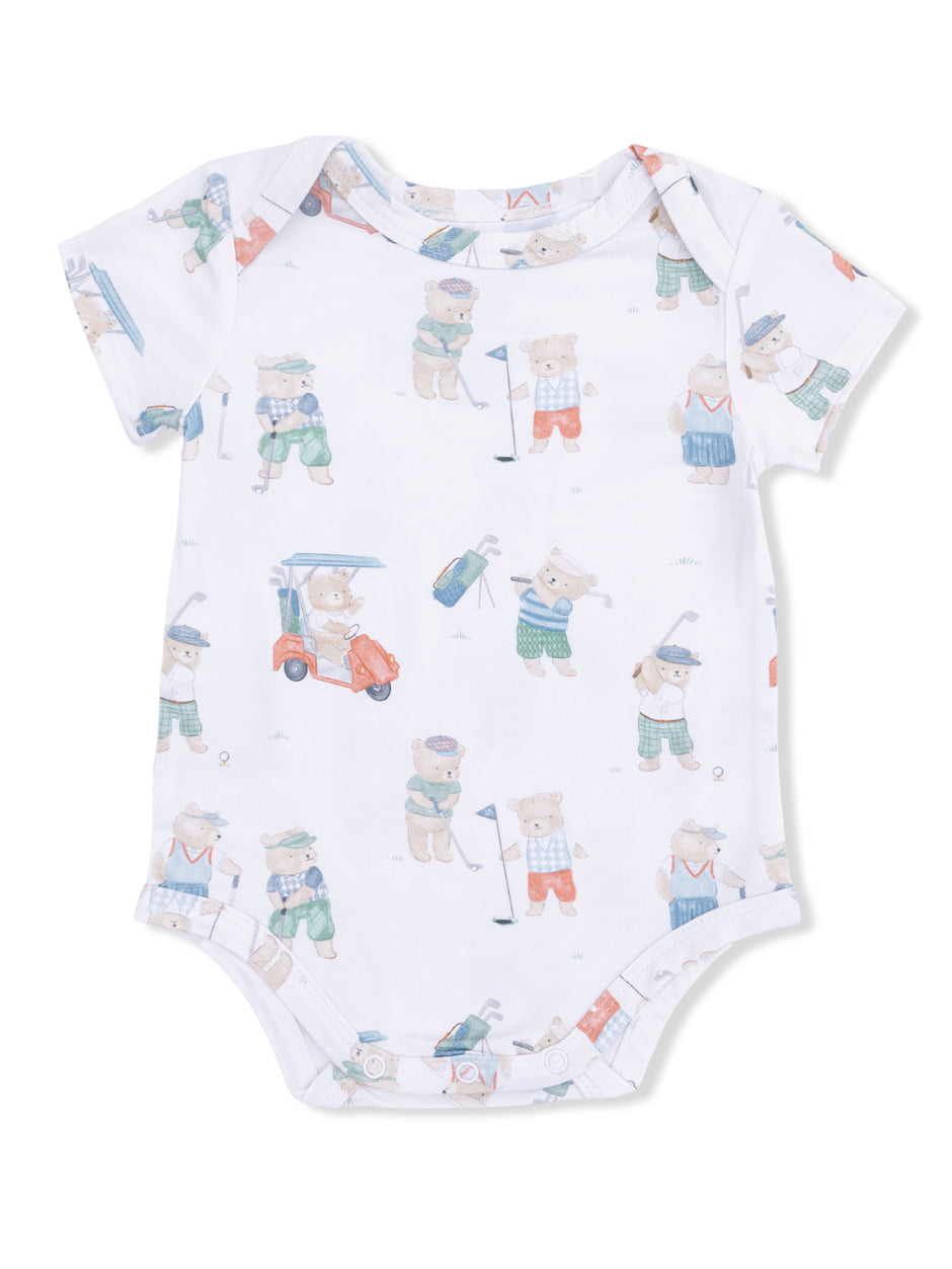 White baby onesie featuring playful illustrations of bears playing golf in various outfits.