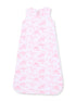 Light pink baby sleeping bag with whimsical nature patterns and sleeveless design.