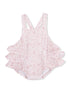 Floral infant romper in light pink with ruffled sleeves and snap closure at the bottom. Perfect for warm weather.