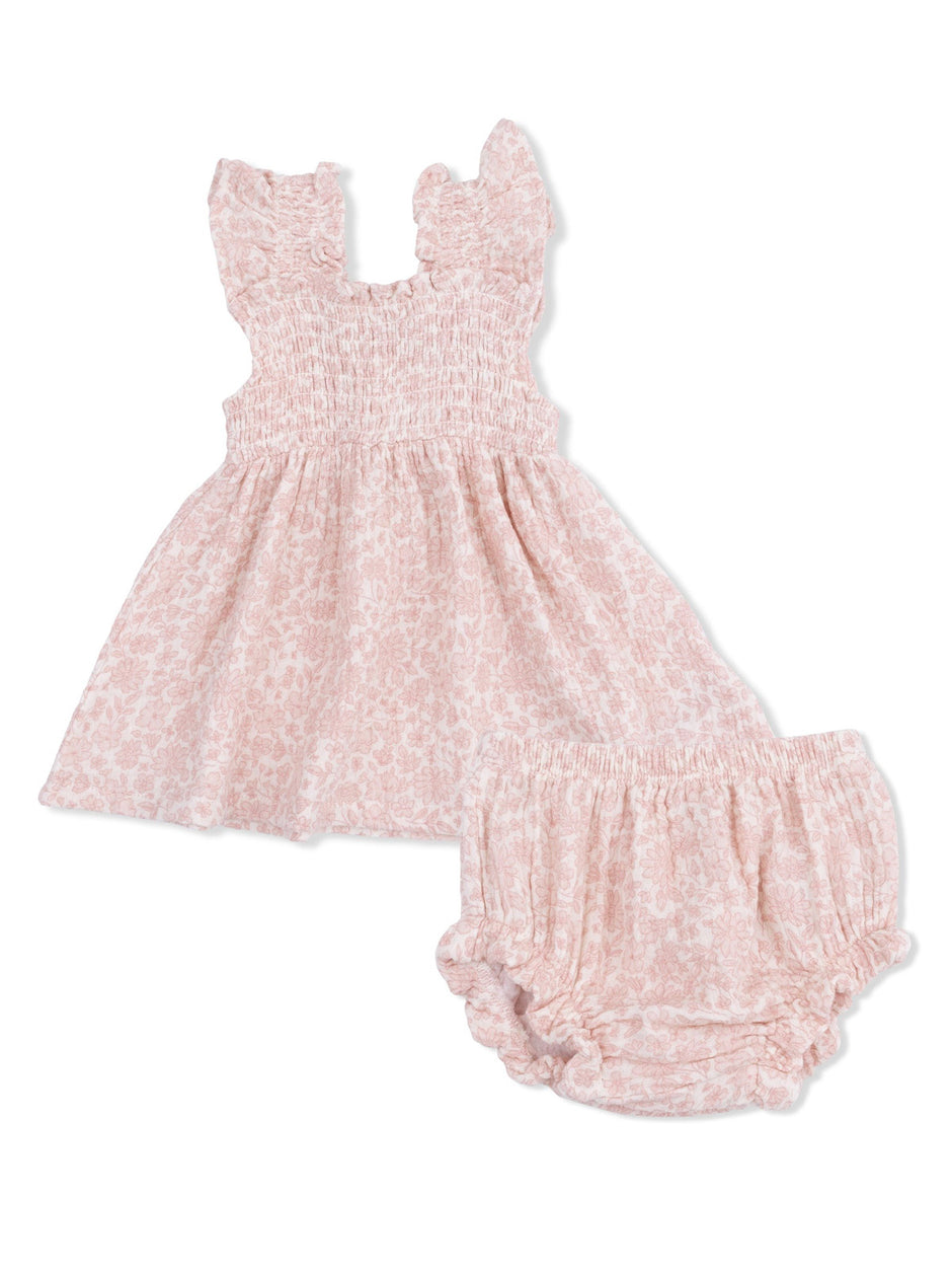 Pink floral dress with ruffled straps and matching bloomer shorts, perfect for a baby girl.