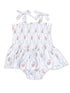 Floral-patterned baby romper with smocked bodice and tie straps, featuring a flared skirt design.