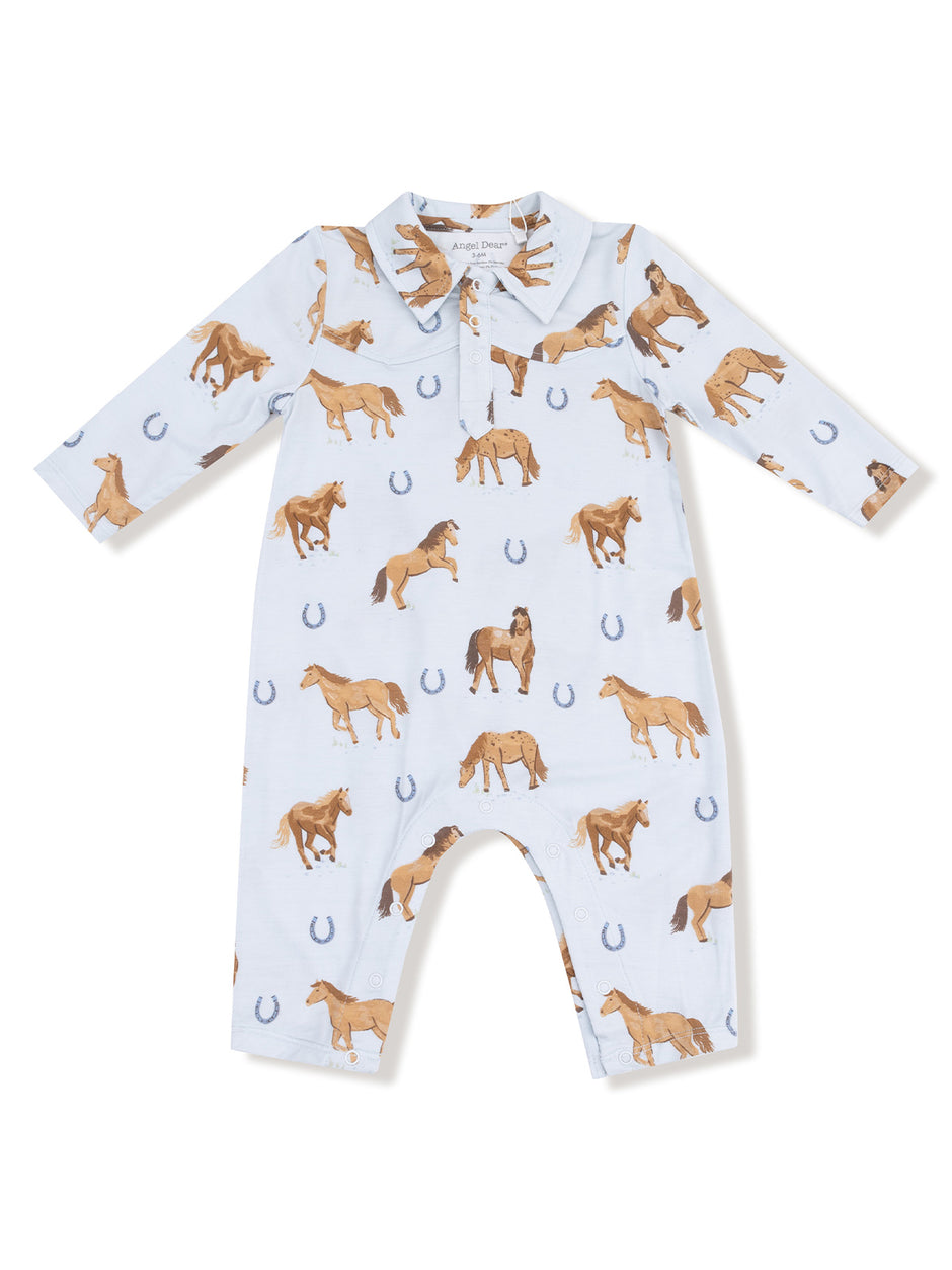 Blue long-sleeve romper with horse prints and horseshoe motifs, designed for babies.