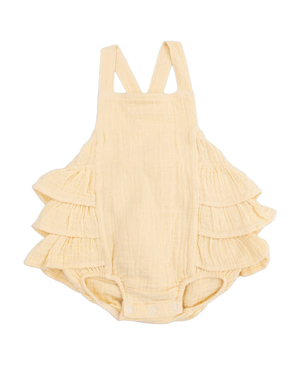Yellow ruffled romper for infants with adjustable straps and snap closures. Soft, breathable fabric.