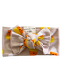 Light pink baby headband with a large bow and candy corn pattern, labeled for ages 0-6 months.