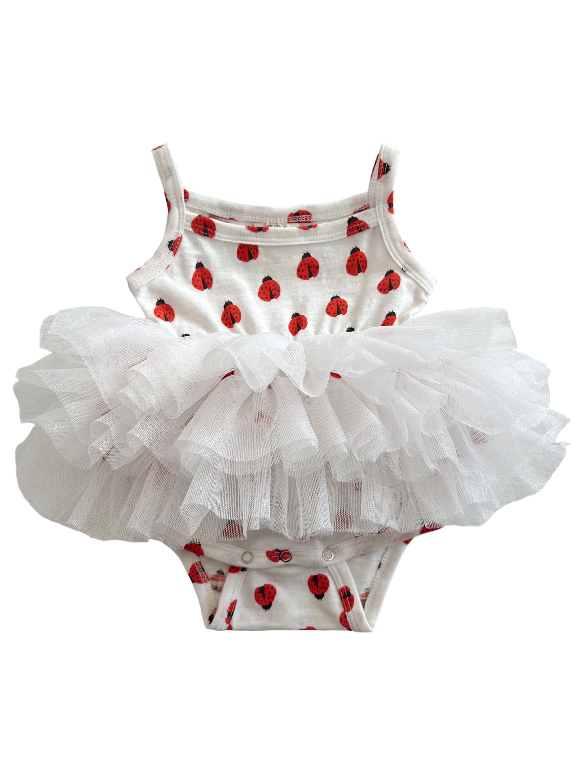 White infant bodysuit with red ladybug print and a layered white tulle skirt attached.