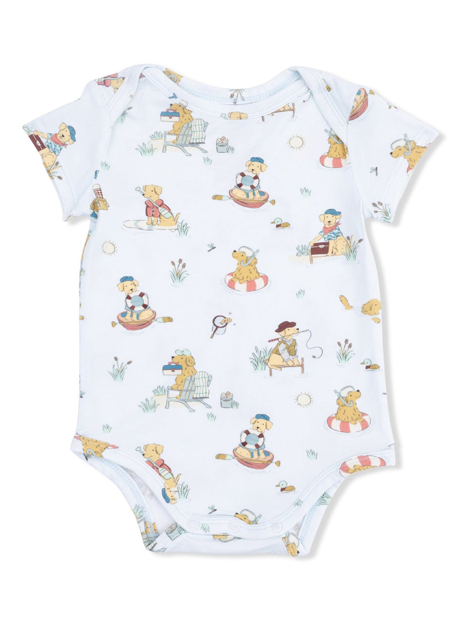 Light blue baby onesie with a playful dog pattern showcasing dogs in various outdoor activities.
